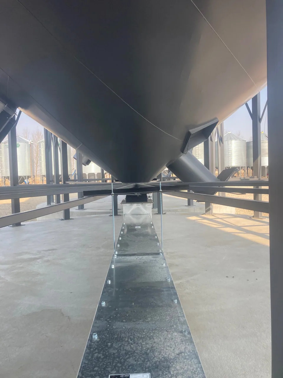 Under-bin conveyor and adjustable support details