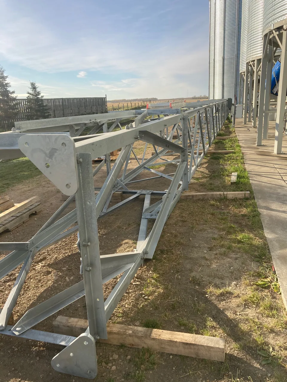 Dryer-feed conveying equipment and tower sections