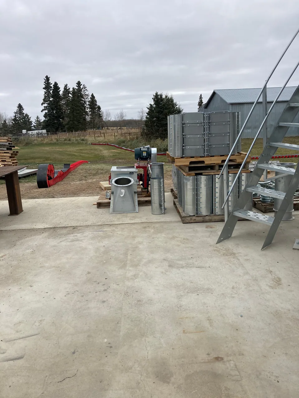 Equipment placement and connections around the hopper bins