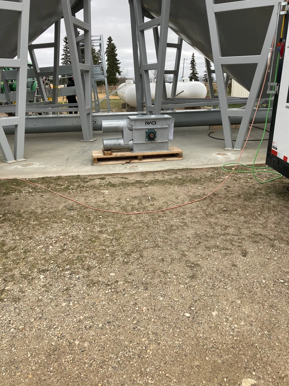 Equipment placement and connections around the hopper bins
