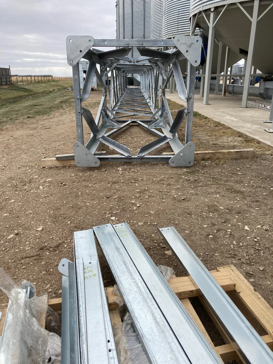 Equipment placement and connections around the hopper bins