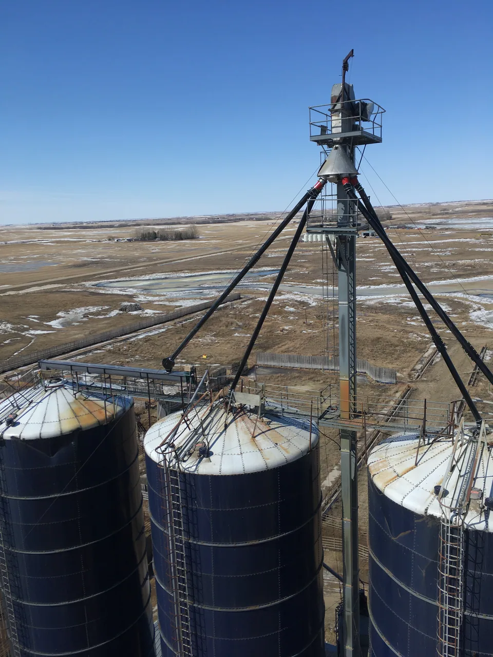 Overhead view of silo spouting and elevator equipment
