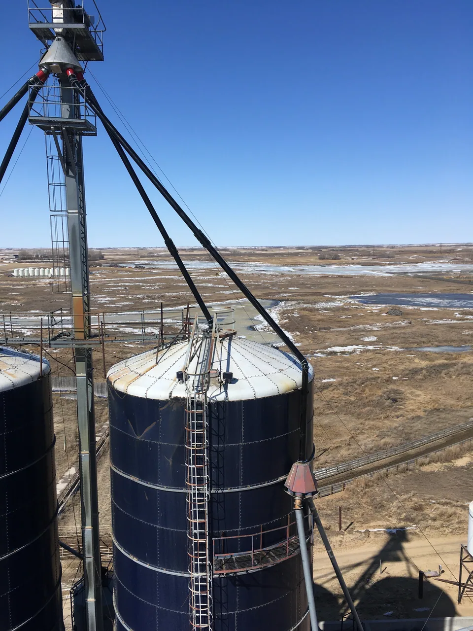 Overhead view of silo spouting and elevator equipment