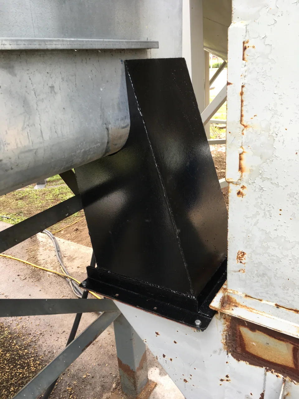 Fabricated transition fitted to existing equipment