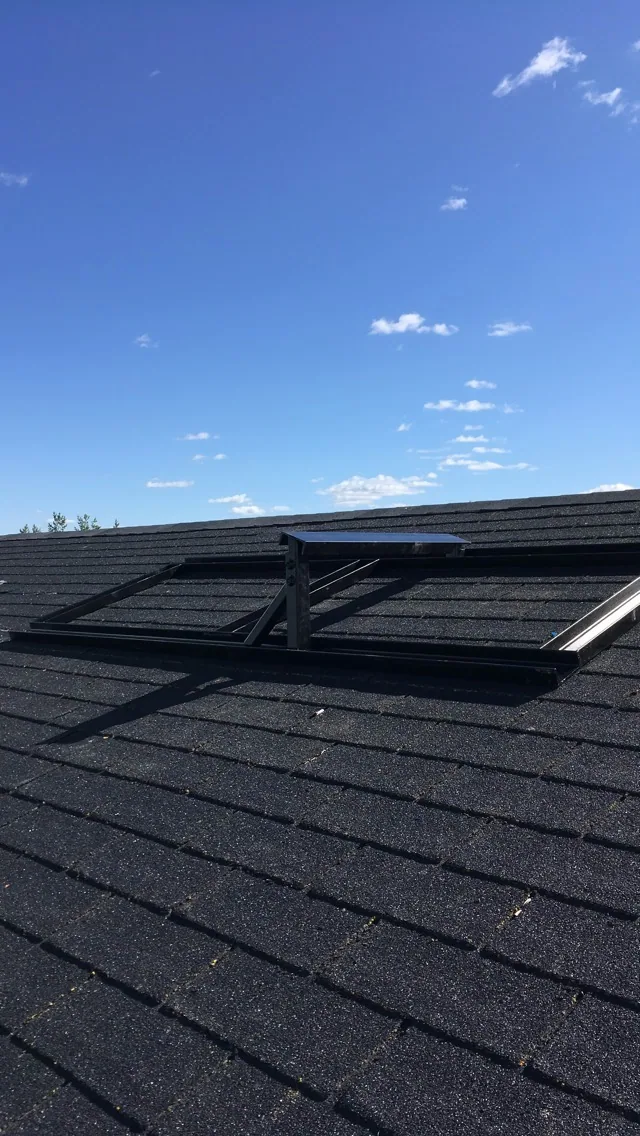 Steel supports fitted around a roof opening