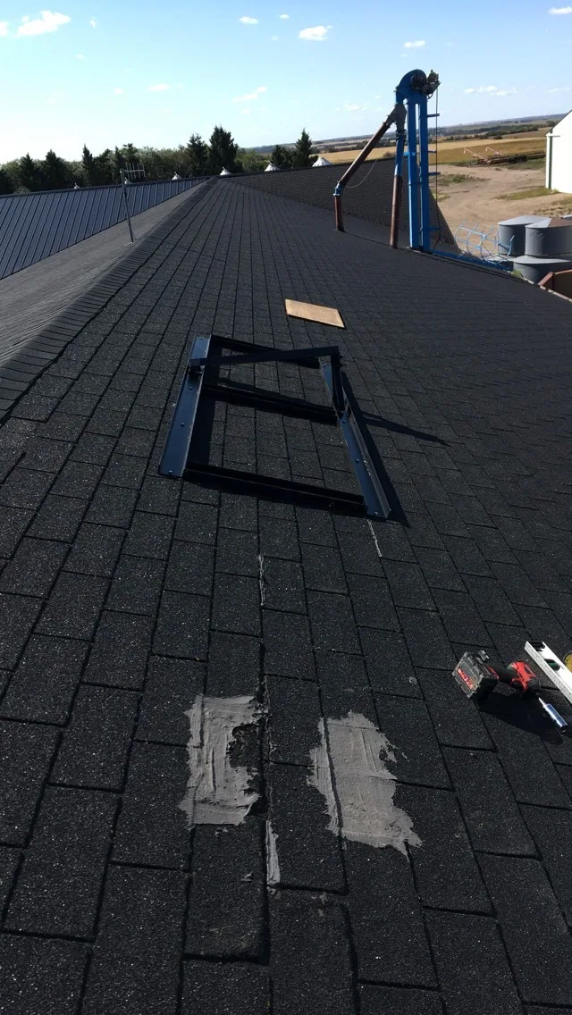 Steel supports fitted around a roof opening
